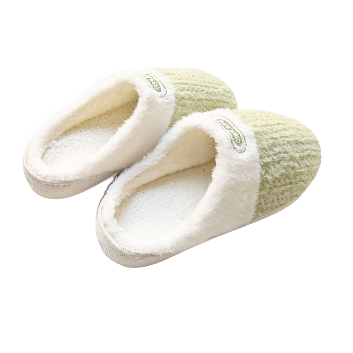 Saliegroene instappantoffels met crèmekleurige voering, van bovenaf gezien